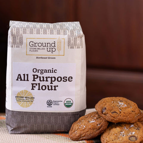 A 53 pound bag of Ground Up Organic All Purpose Flour, with cookies